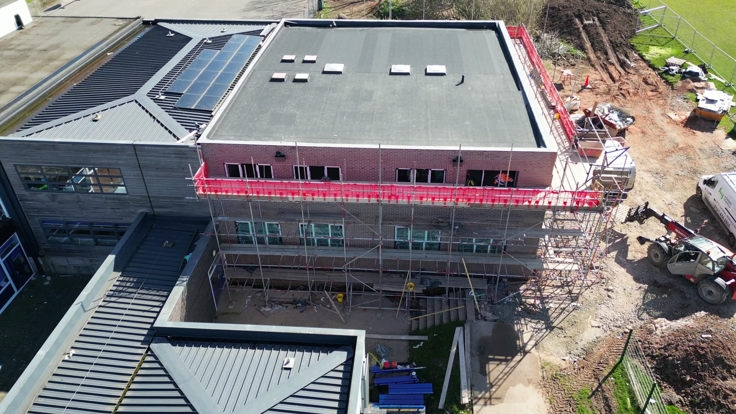 LBS extensions_section leon building services aerial image of school extension project